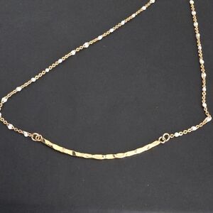 Elegant Gold Chain Necklace with subtle white beads